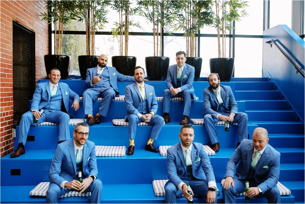 Groomsmen in stylish blue suits in the lobby of the Asbury Hotel