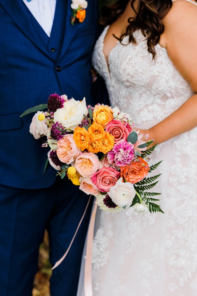 bright orange and pink wedding bouquet