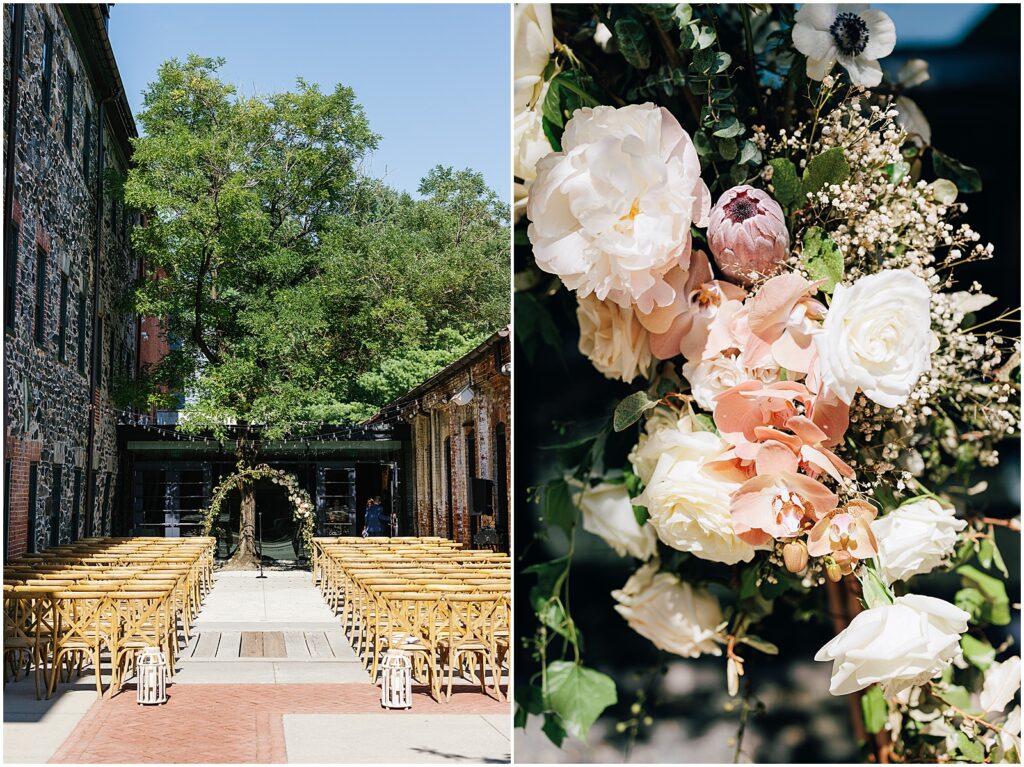 The courtyard of Mt Washington Mill Dye House is set up for a wedding with gold chairs and a floral wedding arch.