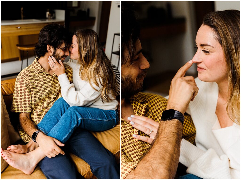 Joey touches a finger to Brittany's nose while they sit on a couch for lifestyle engaglement photos.