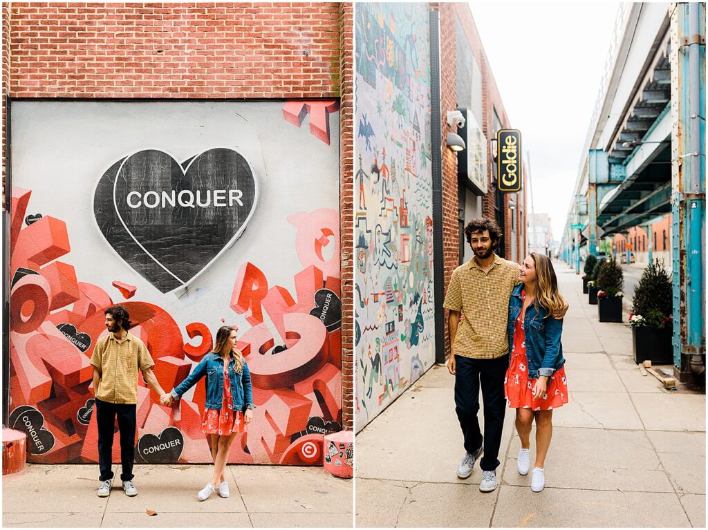 A couple walks down a Fishtown sidewalk during an engagement photo session in Philadelphia.