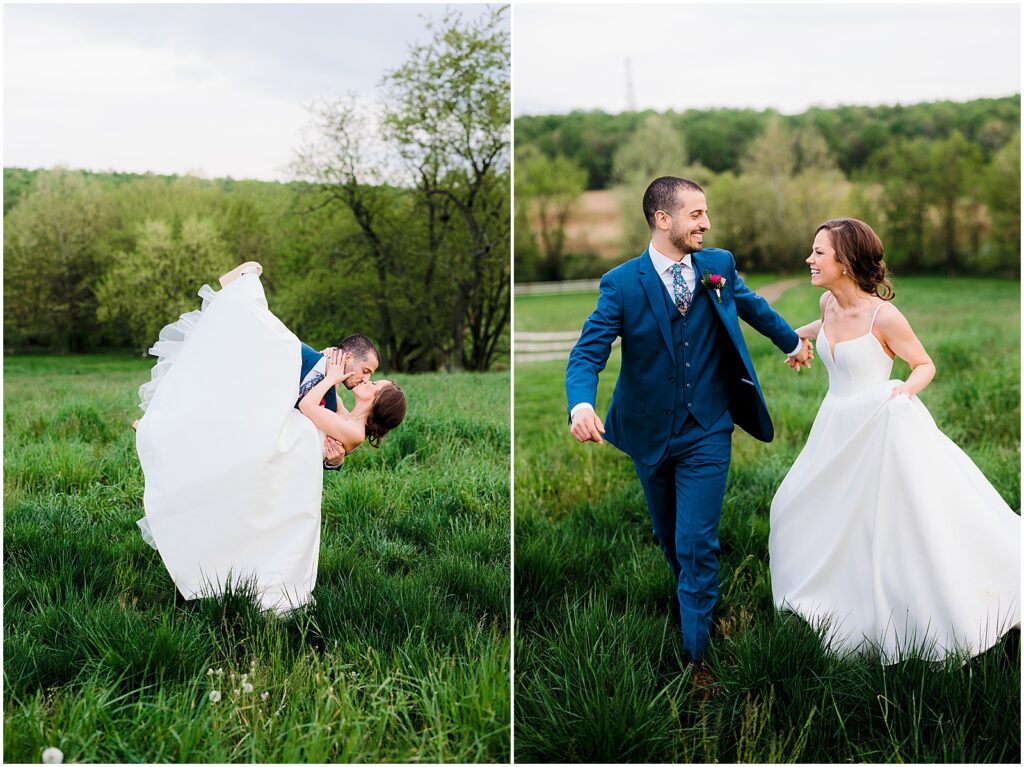 A groom dips a bride for a kiss in a field at a spring wedding.