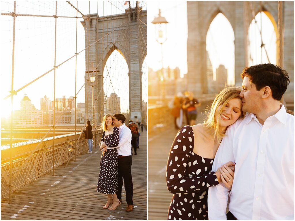 A sunrise casts golden light on a man and woman walking along the Brooklyn Bridge for engagement photos.