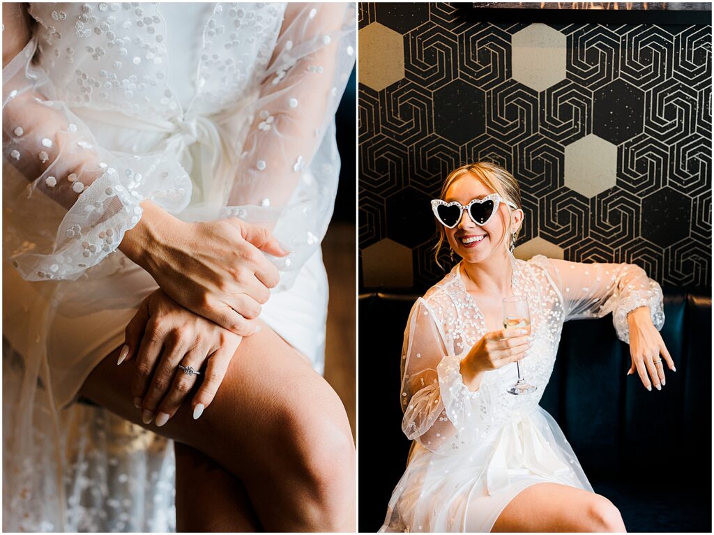 A bride poses in wedding sunglasses with a glass of champagne.
