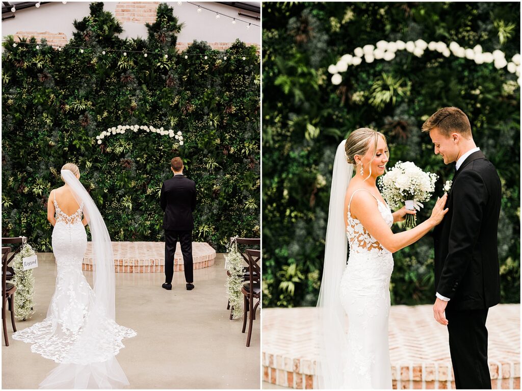 A bride and groom have a first look in a courtyard at Perona Farms.