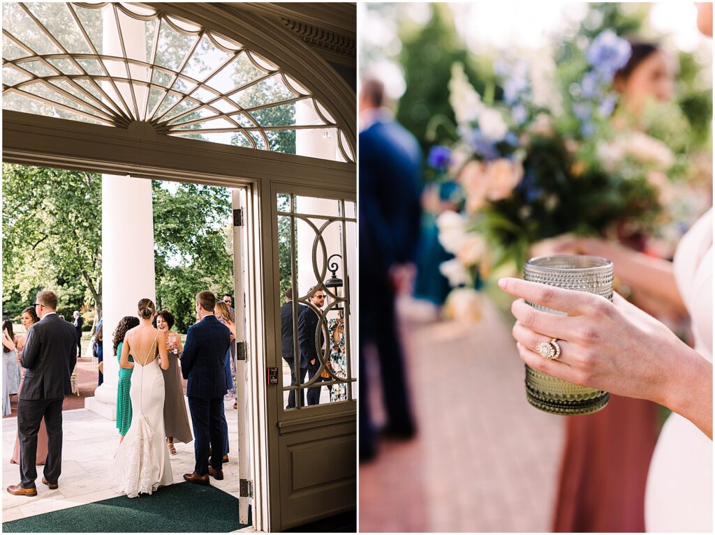 A bride carries a wedding cocktail across the porch at Bellevue Hall during cocktail hour.
