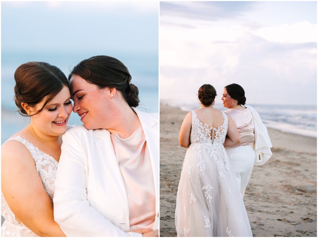 One bride wraps her arms around another's waist on the beach.