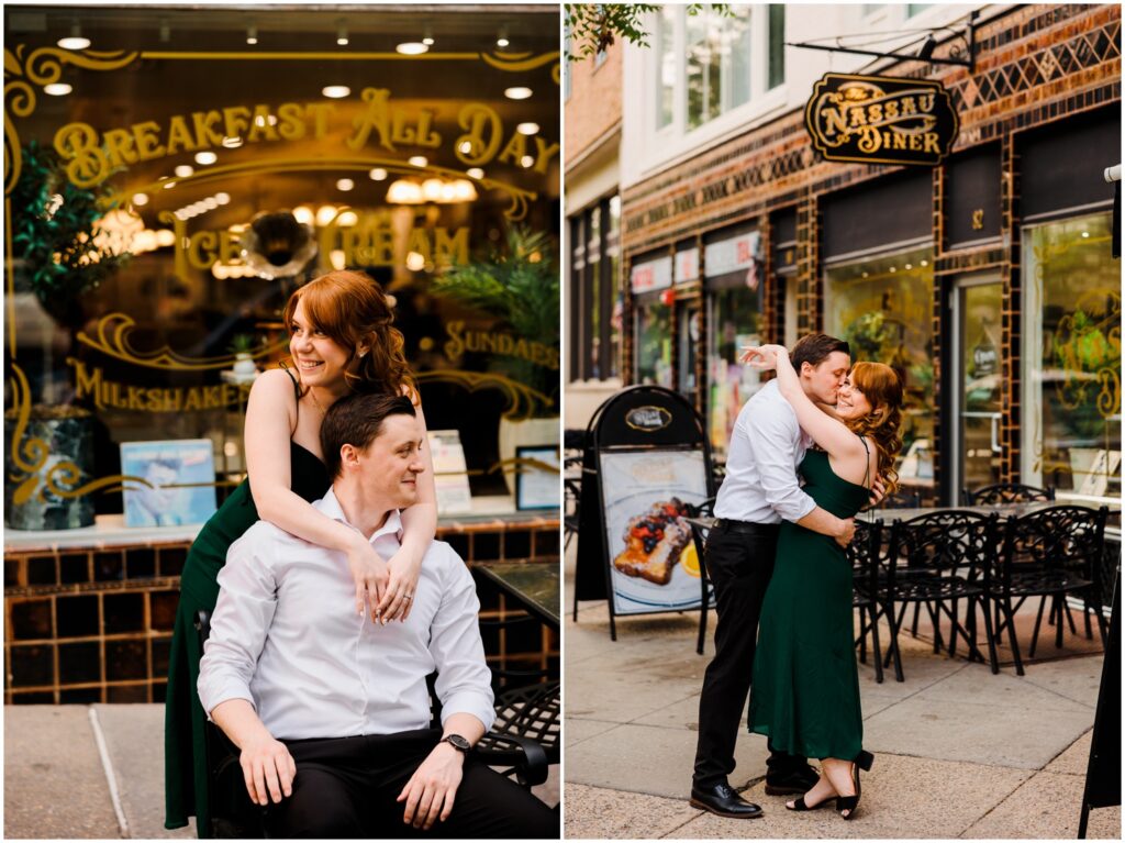 A man and woman kiss on a Princeton sidewalk in an engagement photo.