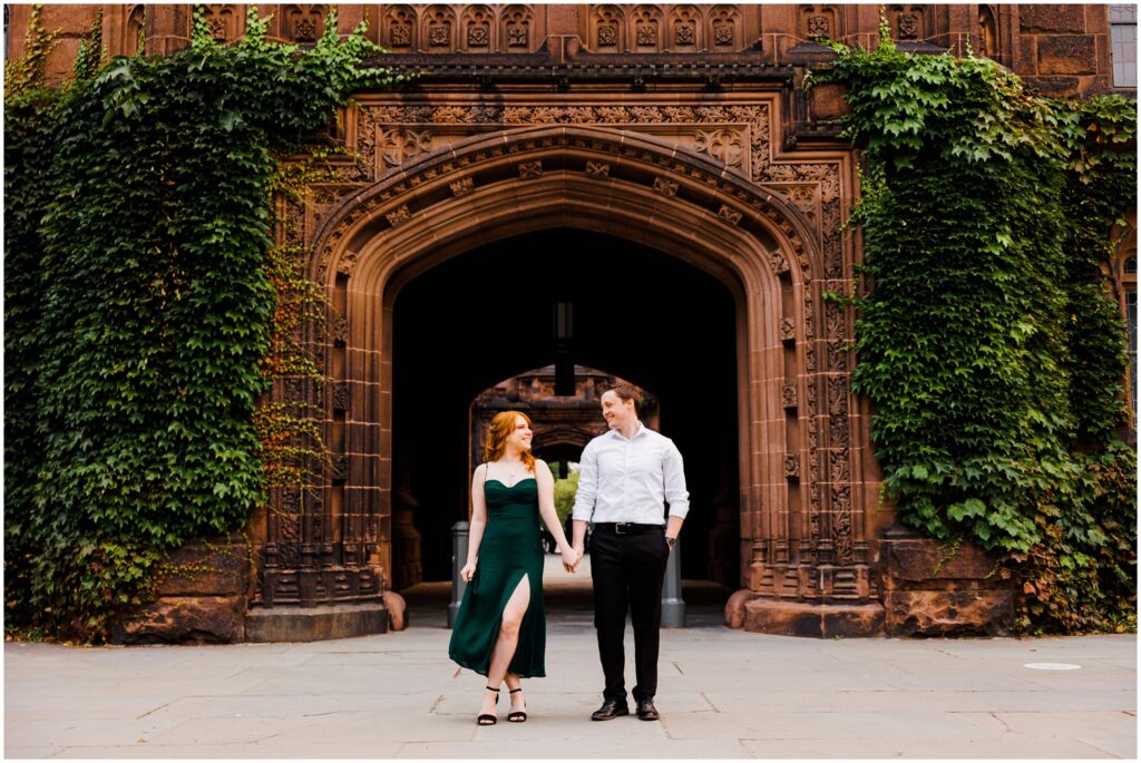 A man and woman walk towards a New Jersey photographer during a Princeton engagement session.