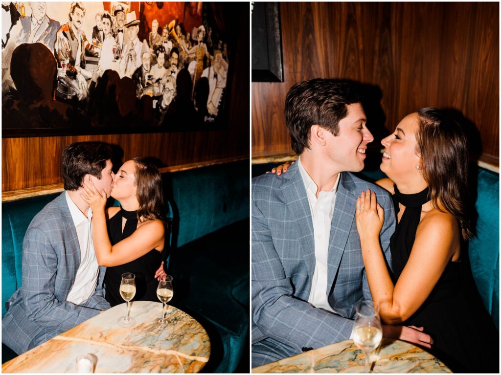 A woman kisses a man beneath a chandelier in a direct flash engagement photo.