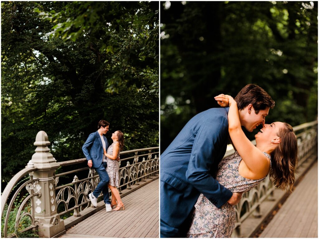 A man and woman lean against the rail of a bridge in Central Park in an engagement photo.