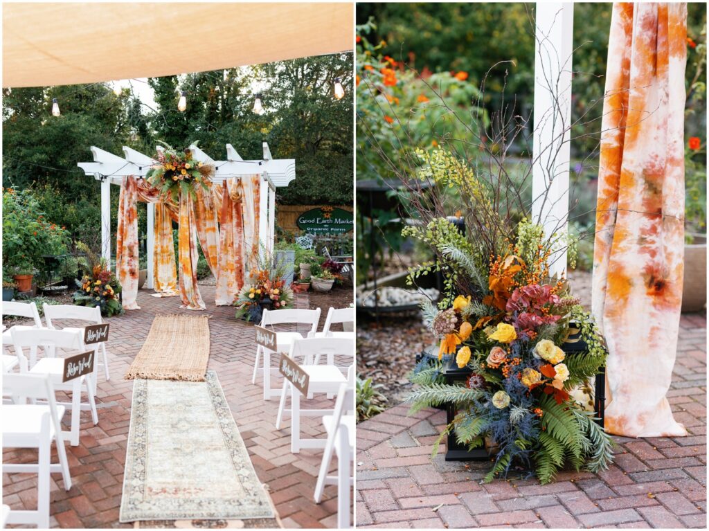 Flowers and antique rugs decorate the garden at Good Earth Market for a wedding ceremony.