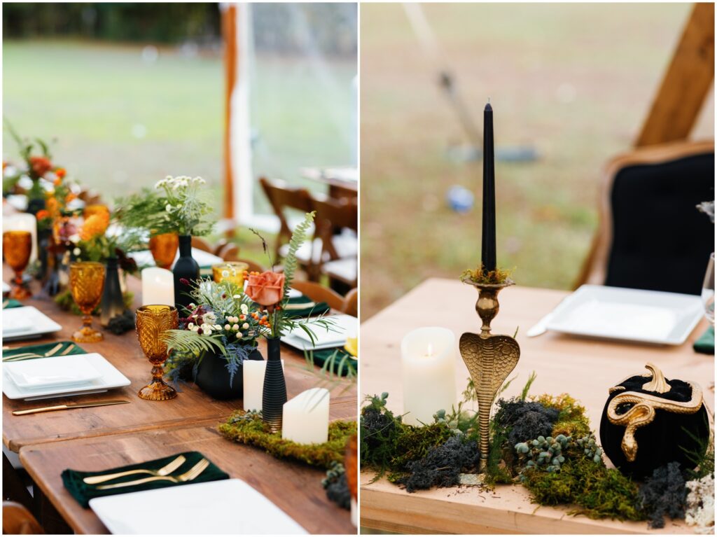 A wedding reception table is decorated with black candles, flowers, and vintage glassware.