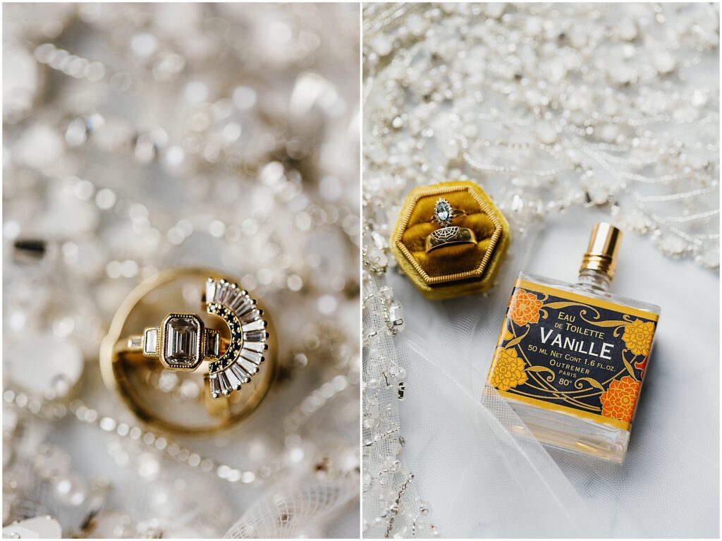 An art Deco perfume bottle and wedding rings sit on a bridal veil.