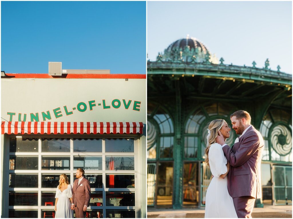 A bride and groom stand in a patch of sun in front of the Tunnel of Love on the Asbury Park boardwalk.