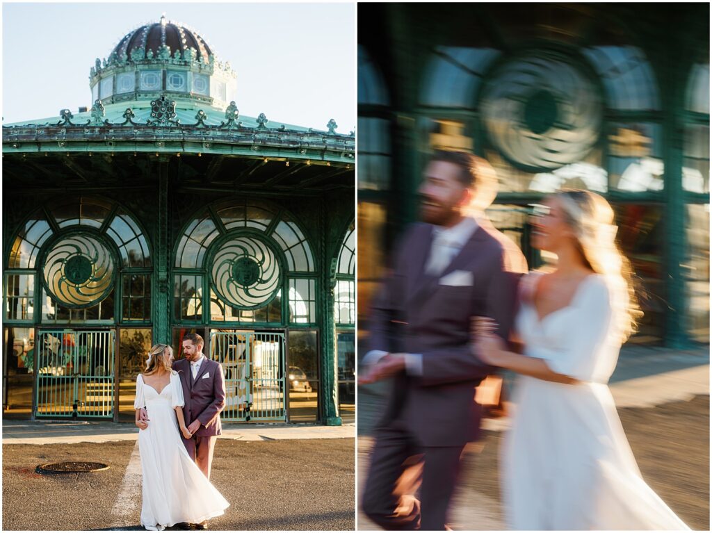 A bride and groom walk past the Carousel House on the Asbury Park boardwalk.