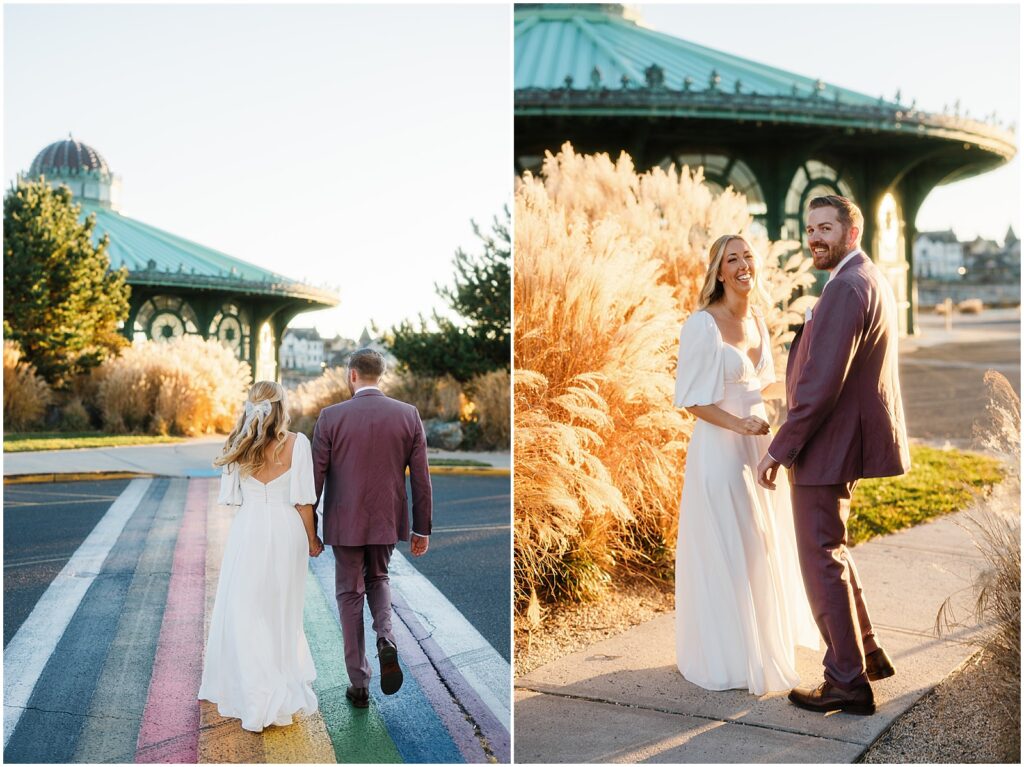 A bride and groom walk across a rainbow-painted crosswalk in Asbury Park.