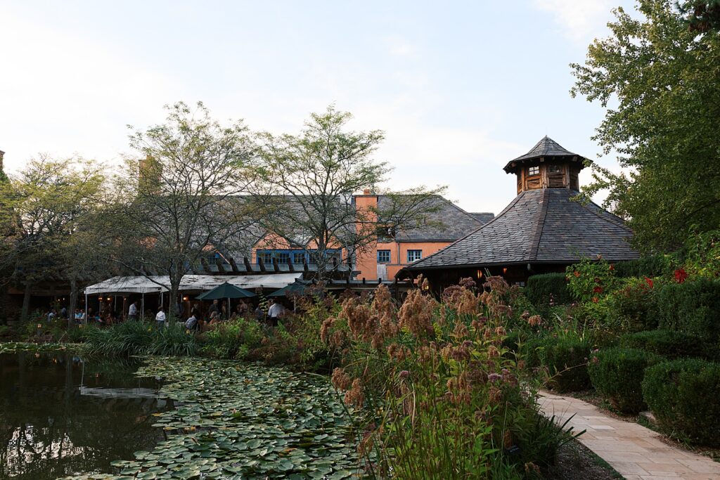 A view of Rat's Restaurant from across Rat's Pond at dusk.