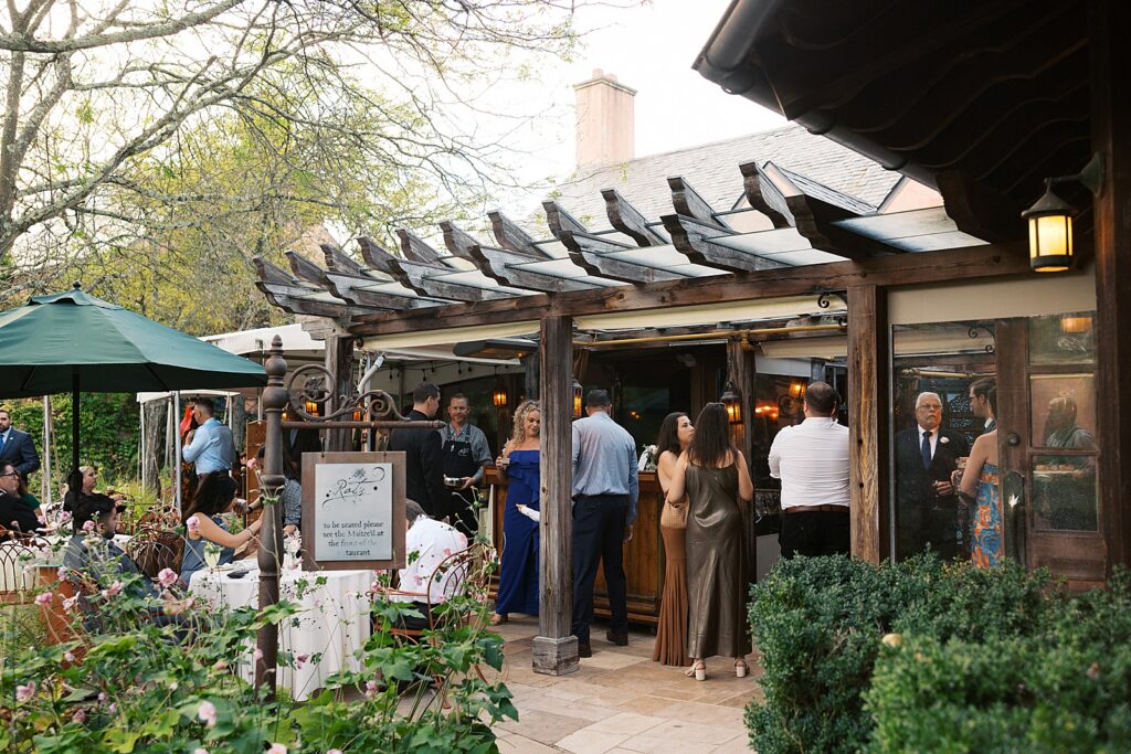 Guests enjoy cocktail hour on the patio at Rat's Restaurant.
